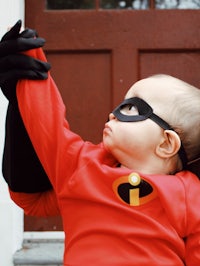 a baby dressed up as the incredibles