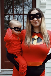 a woman and child dressed up as the incredibles